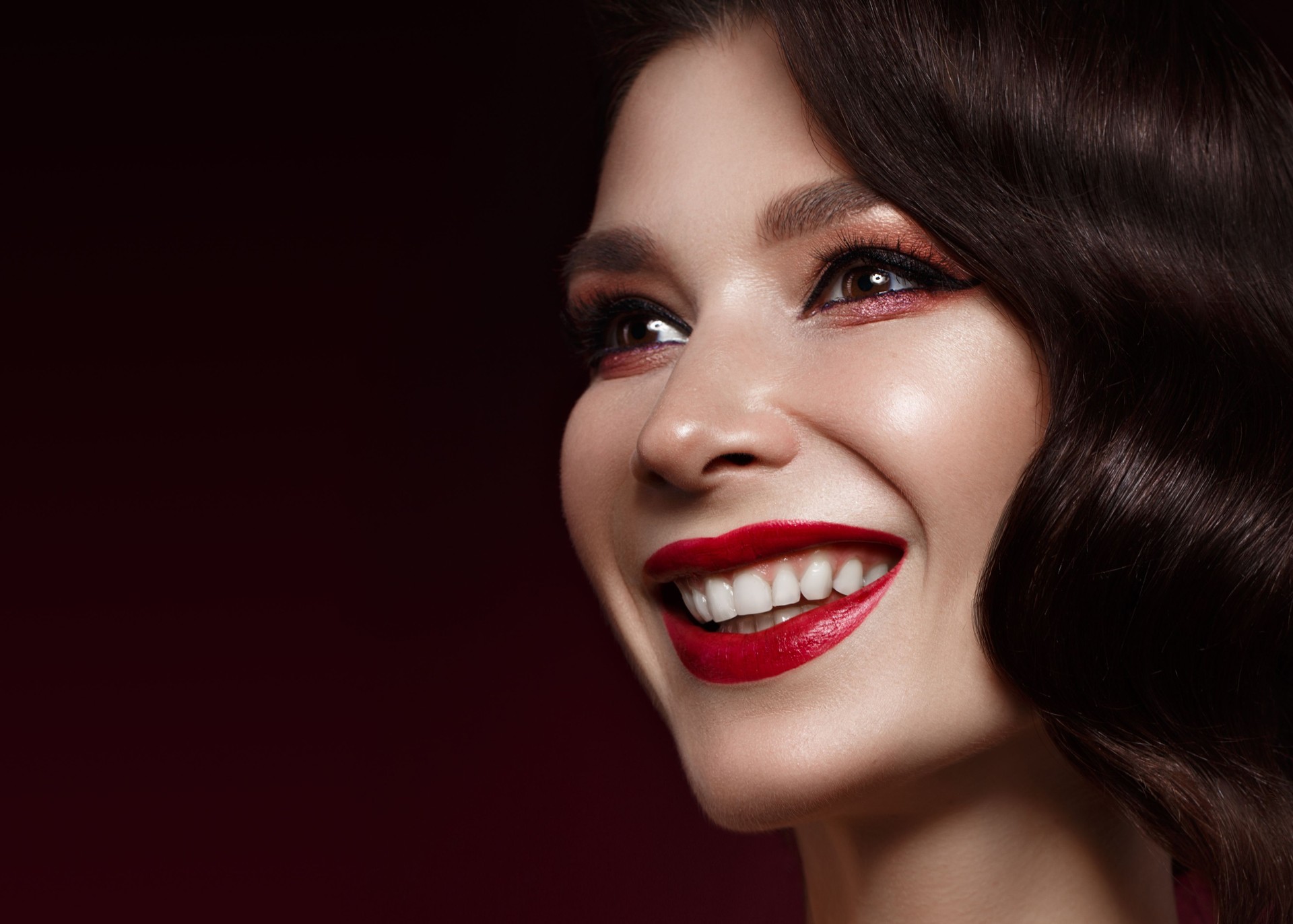 beautiful girl in Hollywood image with wave hair and classic makeup. Beauty face.